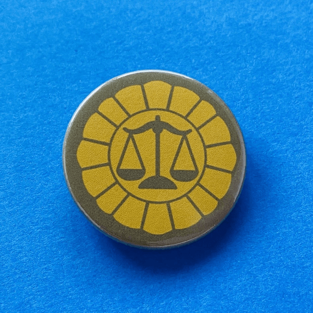 AA: defense attorney badge (button large)