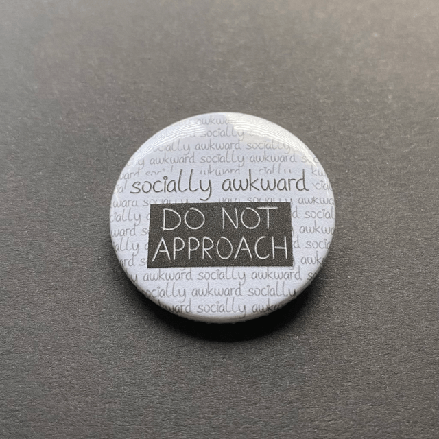 M: socially awkward (button small)