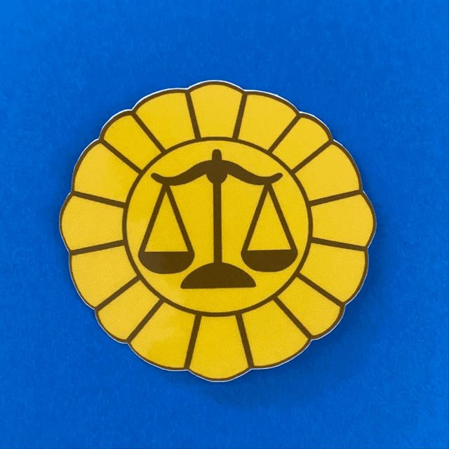 AA: defense attorney badge (laminated sticker)